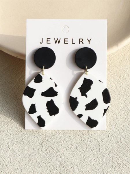 Boucles d'oreilles avec imprimé vache